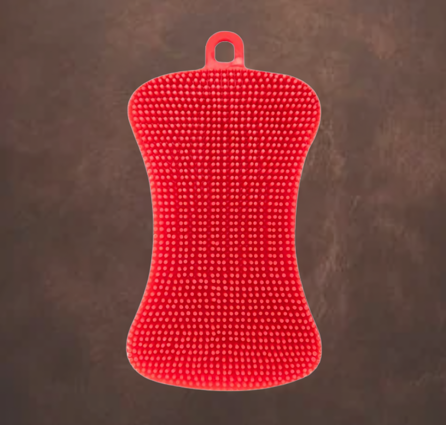 Eponge rouge en silicone  sur fond marron