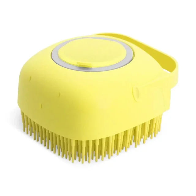 brosse a shampoing pour animaux jaune sur fond blanc