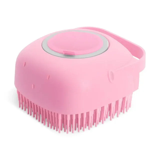 brosse a shampoing pour animaux rose sur fond blanc